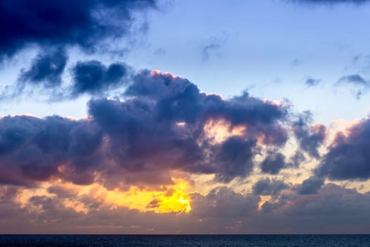 Dramatic sunrise over the ocean before storm - Lanzarote, Canary Islands, Spain