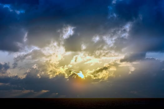 Dramatic sunrise over the ocean before storm - Lanzarote, Canary Islands, Spain