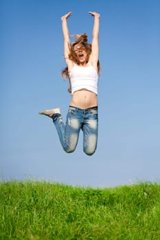 Happy girl on summer meadow