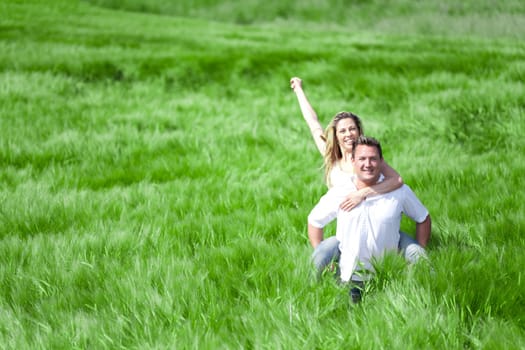 Happy People on summer Meadow