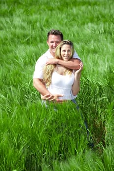 Happy People on summer Meadow