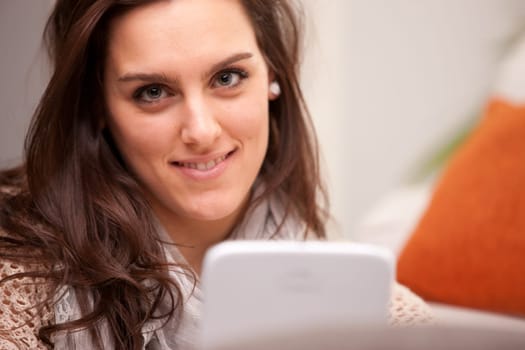 this girl has no broblem with mobile devices and she loves to use tablet smartphone or other mobile technology