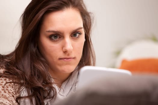 this girl has no broblem with mobile devices and she loves to use tablet smartphone or other mobile technology