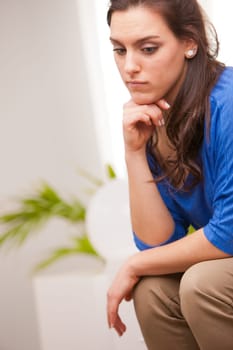 young woman thinking about what's going to happen to her life or her future or job