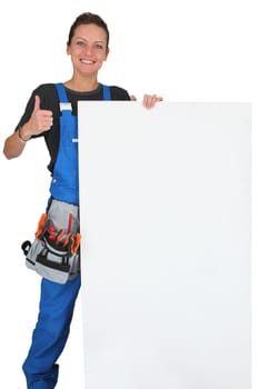 Woman with plumbing tools