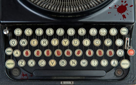 Old typewriter with terrorism