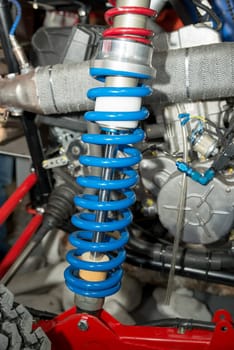 sports car shock absorber with a blue spring