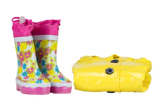Rubber boots and elegance rain jacket yellow for girl. white isolated.