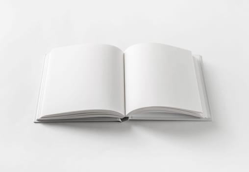Blank book on white paper background.