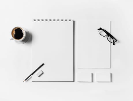 Blank branding stationery set on white paper background. Top view. Flat lay.