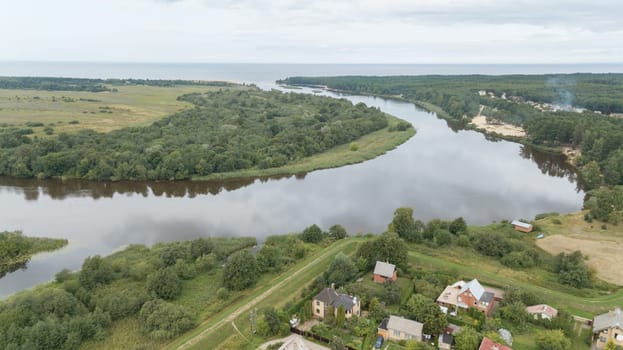 Aerial view of countryside Gauja lake field drone top view