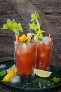 Colourful cocktail with tomato juice,garnished with vegetables