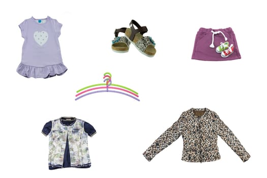 Collage of children clothes. Concept spring and summer clothes. Isolated on white. Close up.