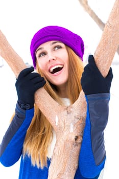 Young girl playing in the snow