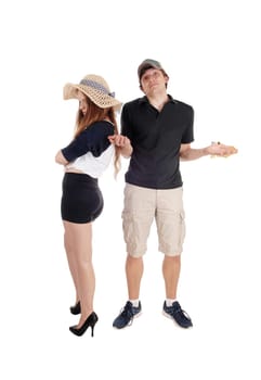 An upset young couple standing isolated for white background turning.there back and are helpless about the situation.