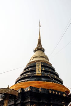 lanna style architecture black pagoda Thailand Lampang province buddhism