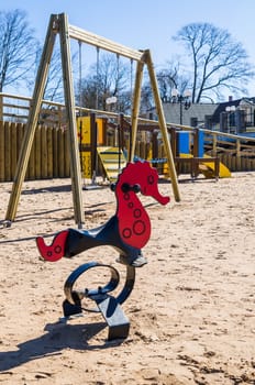 Children's swing in the form of a seahorse