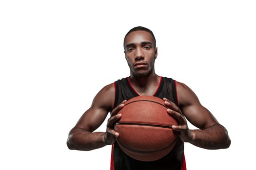 The portrait of a basketball player with a ball isolated on white studio background. advertising concept