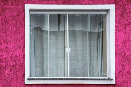 modern glass window textured pink wall architecture