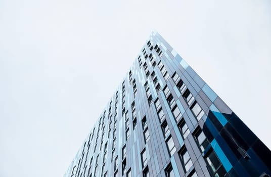 Low angle view of an office building in a city.
