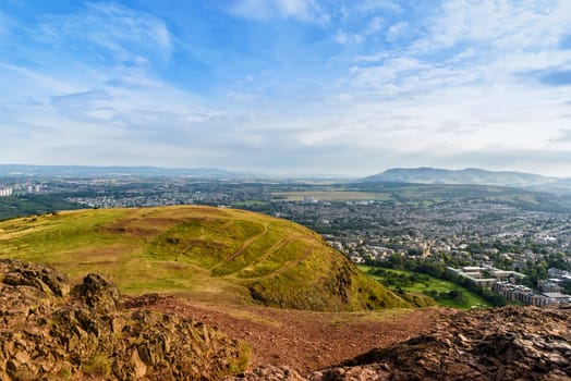 cityscape view of Edinburgh from Arthur's Seat peak, Scotland, United Kingdom