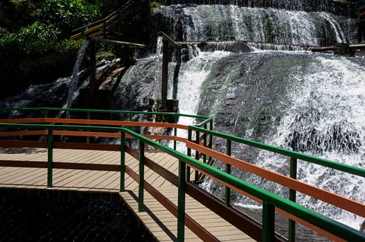 tourism destination Campos do Jordao Brasil water pipe wooden bridge