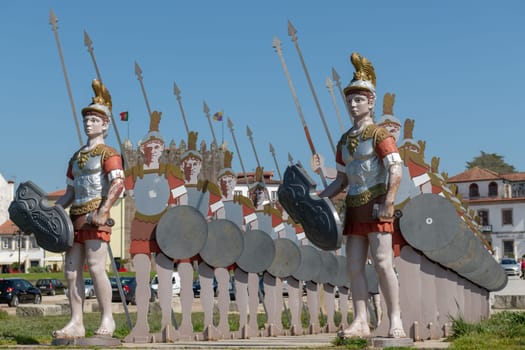 PONTE DE LIMA, PORTUGAL - CIRCA APRIL 2018: Statues of roman soldiers near Lima River at Ponte de Lima.