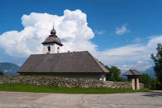 Church of St. Catherine, Zasip, Slovenia, Europe. Typical small historic ancient country mountain Saint Catherine church, slovenian Alps. Mountain slovenian landscape, Julian Alps, near Bled, Slovenia