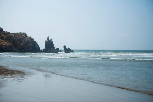 rocky coast along the ocean. Peru