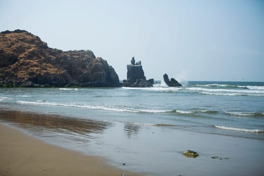 rocky coast along the ocean. Peru