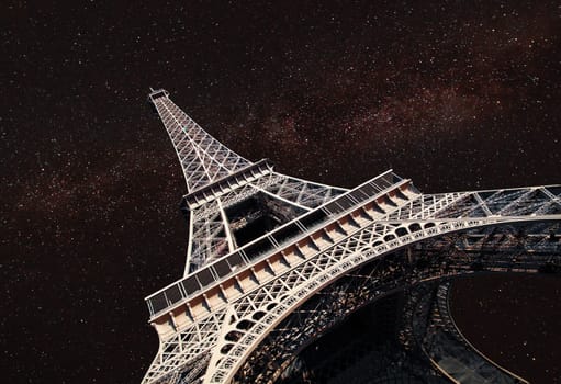 Starry night over Eiffel Tower . At night, under the light of stars.