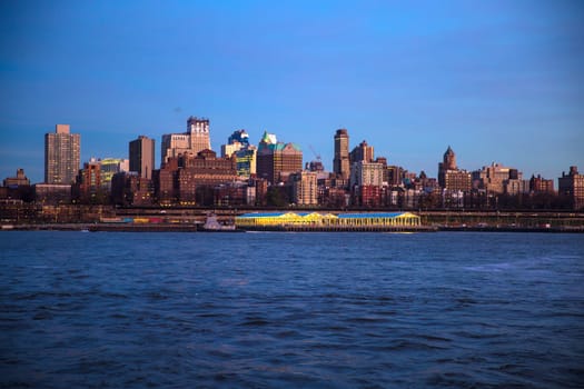 Manhattan Midtown skyline at dusk over Hudson River, New York City