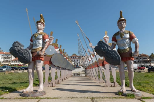 PONTE DE LIMA, PORTUGAL - CIRCA APRIL 2018: Statues of roman soldiers near Lima River at Ponte de Lima.