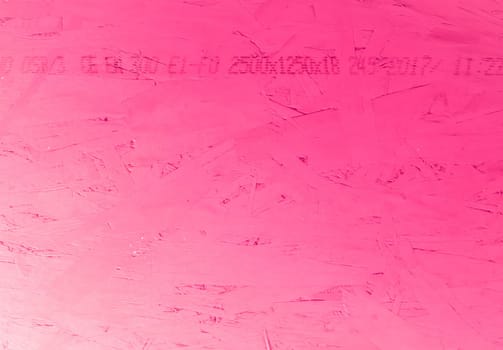 Abstract fuchsia background. Brushstrokes of color on a wall.