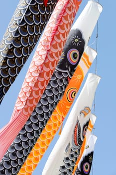 Japanese carp streamer decoration against blue sky, Children's Day