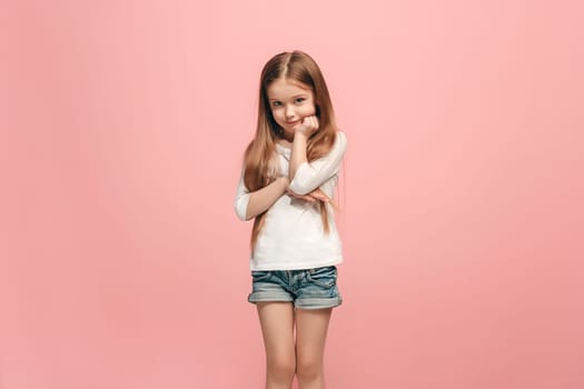 Serious, sad, doubtful, thoughtful teen girl atanding at studio. Human emotions, facial expression concept