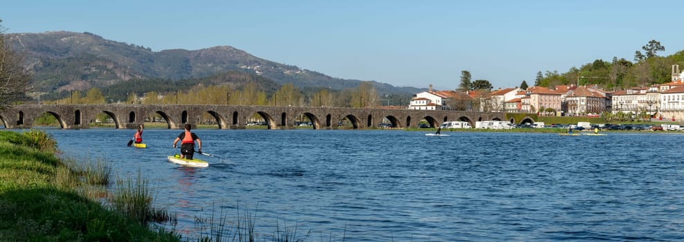 PONTE DE LIMA, PORTUGAL - CIRCA APRIL 2018: Roman bridge crossing the Rio Lima in Ponte de Lima on the Camino de Santiago.