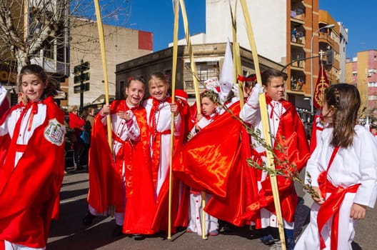 Sunday 17 march 2018, Badajoz, Spain.  unidentified children participate in Palm Sunday Procession. The palm leaves represent the arrival of Jesus Christ on Palm sunday in jerusalem