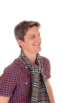 A happy smiling young man in a portrait in a checkered shirt with a .scarf around his neck, isolated for white background.
