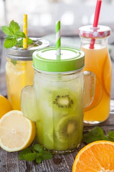 Colourful seeds on ice with fresh fruits