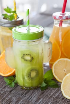 Colourful seeds on ice with fresh fruits