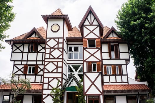 colonial swiss architecture building day city campos do jordao Brazil clock tower