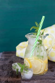 Homemade lemonade with lemon and mint