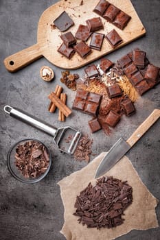 Delicious chocolate on a rustic grey background