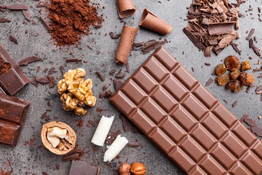 Delicious chocolate on a rustic grey background