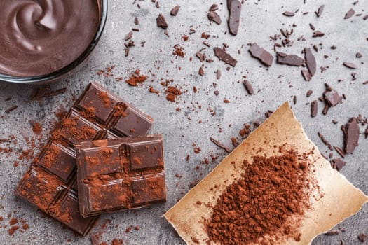 Delicious chocolate on a rustic grey background