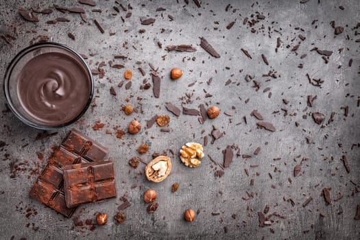 Delicious chocolate on a rustic grey background