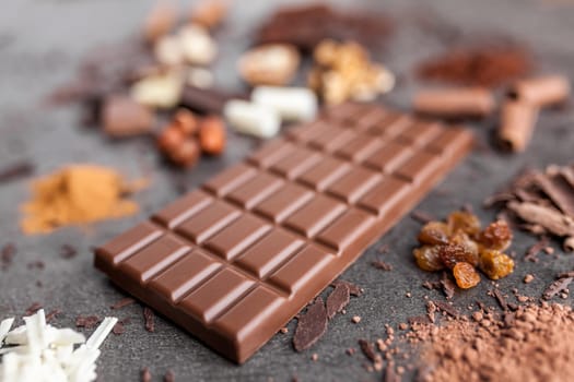 Delicious chocolate on a rustic grey background