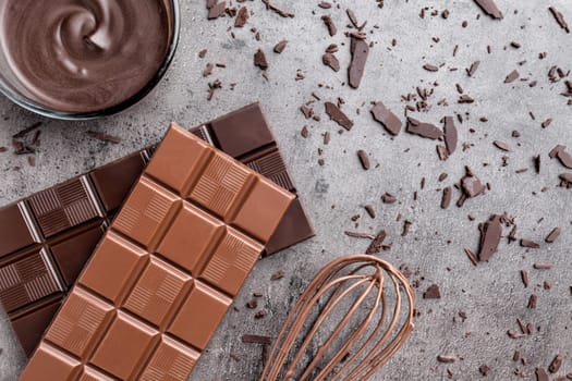 Delicious chocolate on a rustic grey background
