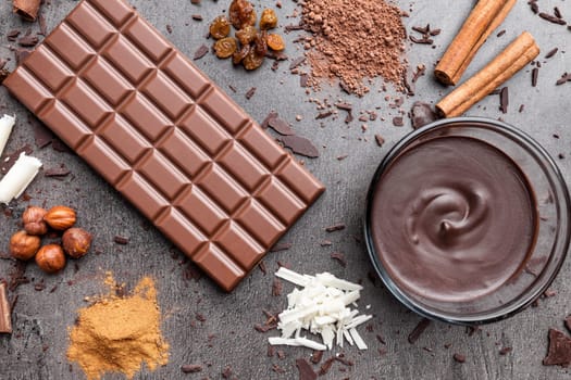 Delicious chocolate on a rustic grey background